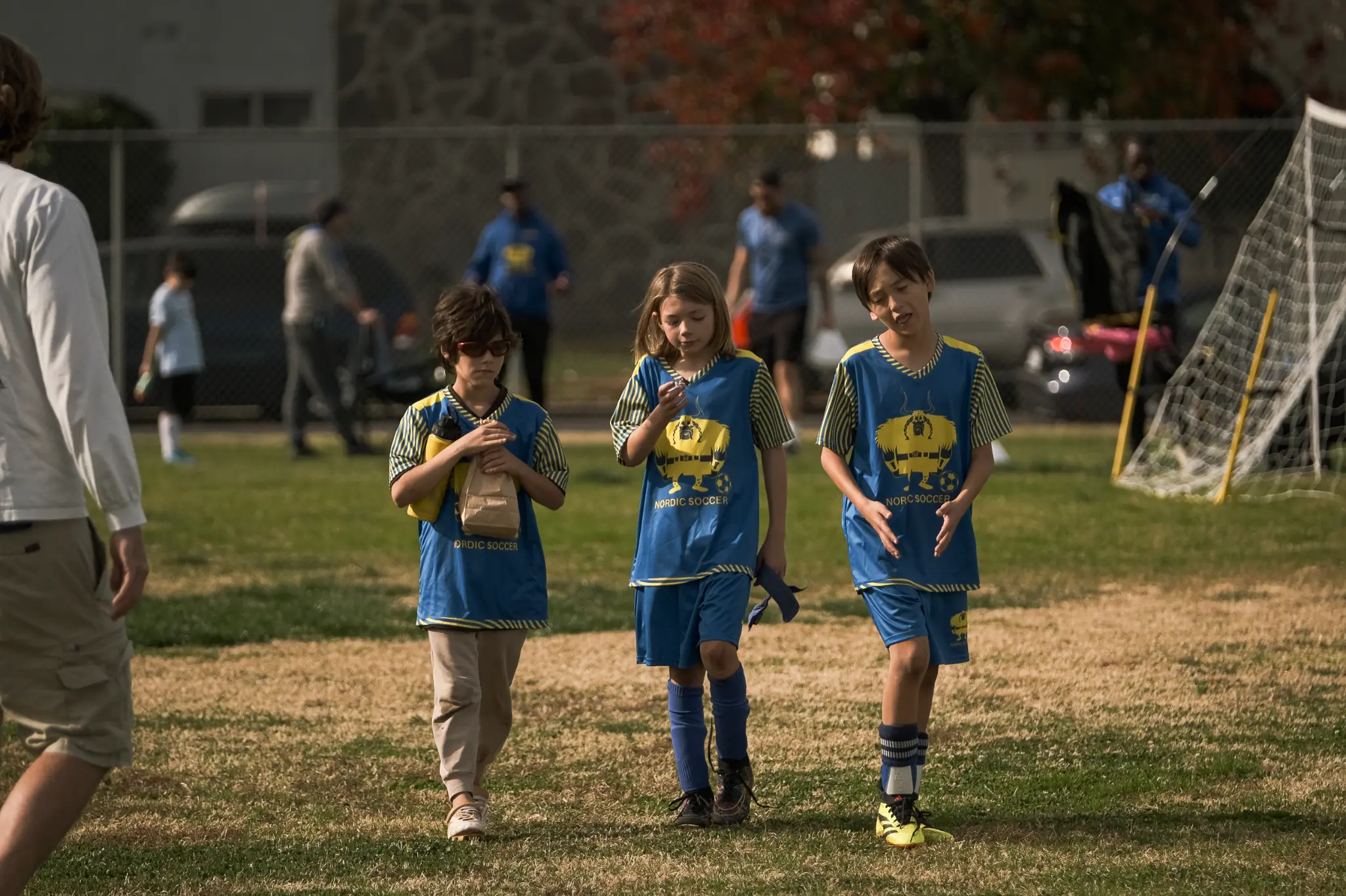 Nordic Soccer players practicing ball control and dribbling skills on grass field at Colfax Charter Elementary in Valley Village